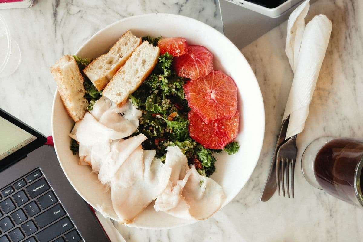 Turkey and leafy greens bowl with grapefruit; illustrative photo without the recipe’s sweet potato and spinach