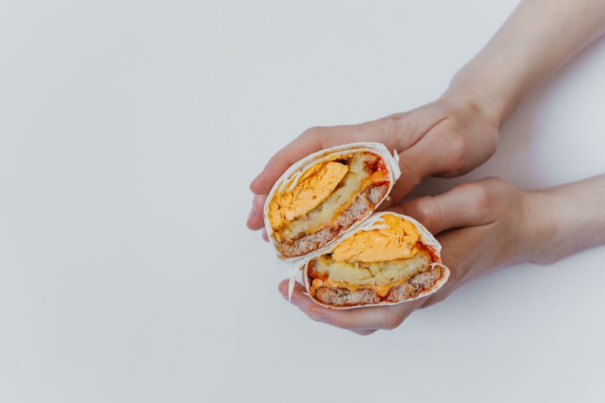 Egg and cheese breakfast wrap, as a serving illustration