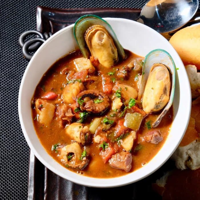 Portuguese fish stew (Caldeirada de peixe) prepared and served as the finished dish