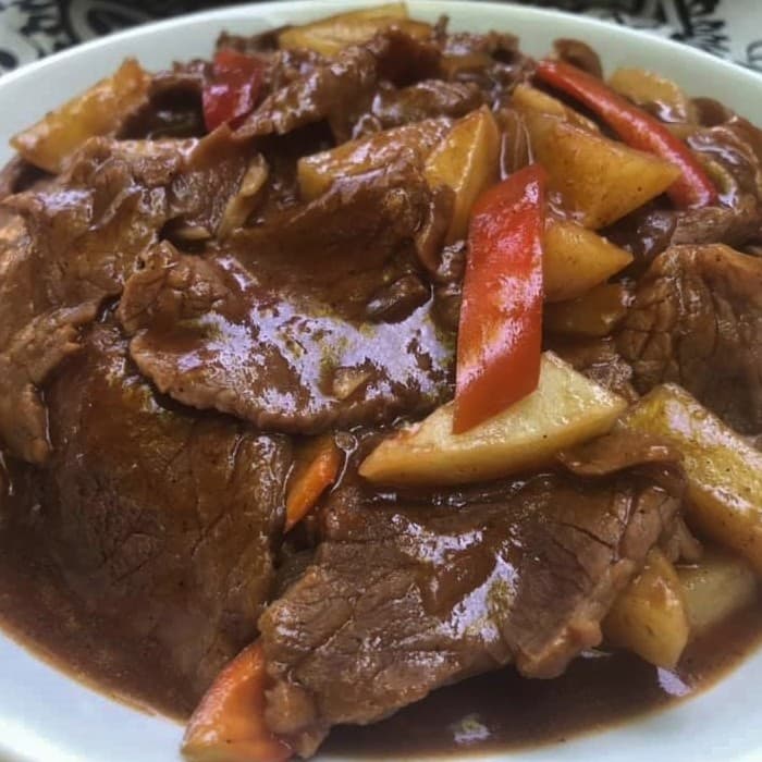 Beef Asado prepared and served as the finished dish
