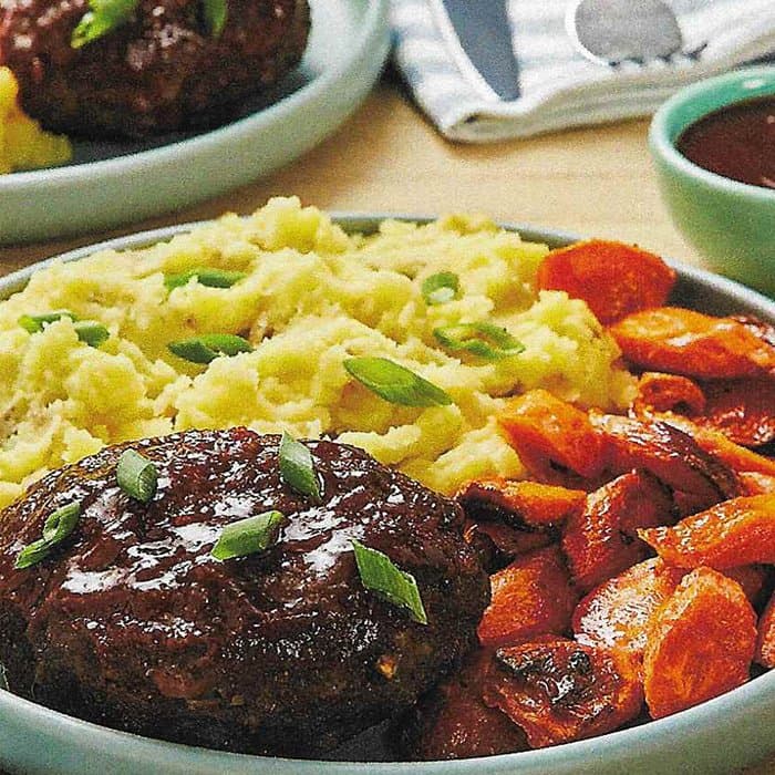 Soy-Glazed Meatloaves with Wasabi Mashed Potatoes & Roasted Carrots prepared and served as the finished dish