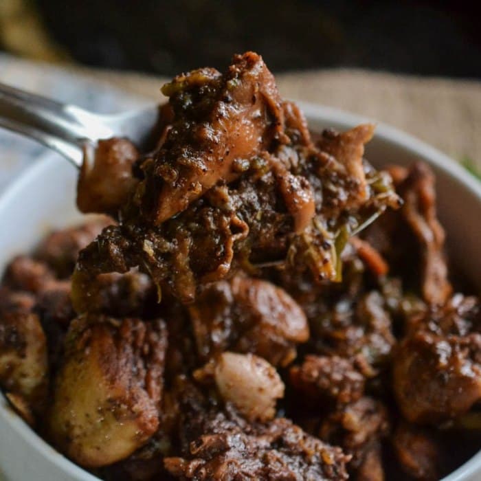 Brown Stew Chicken prepared and served as the finished dish