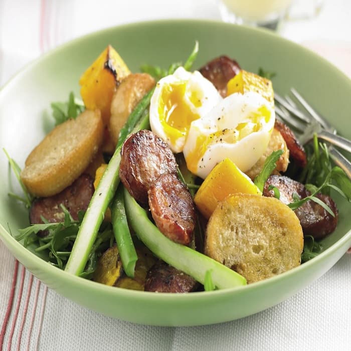 Chorizo & soft-boiled egg salad prepared and served as the finished dish
