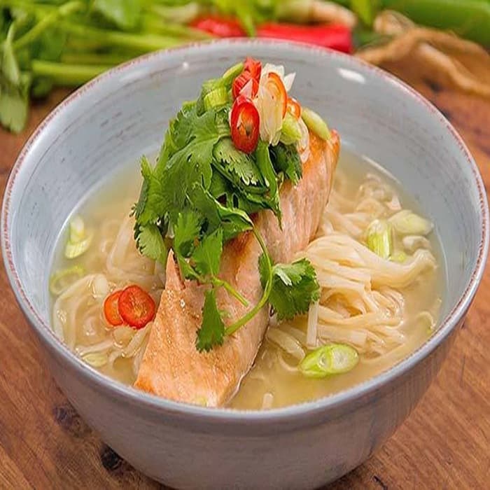 Salmon noodle soup prepared and served as the finished dish