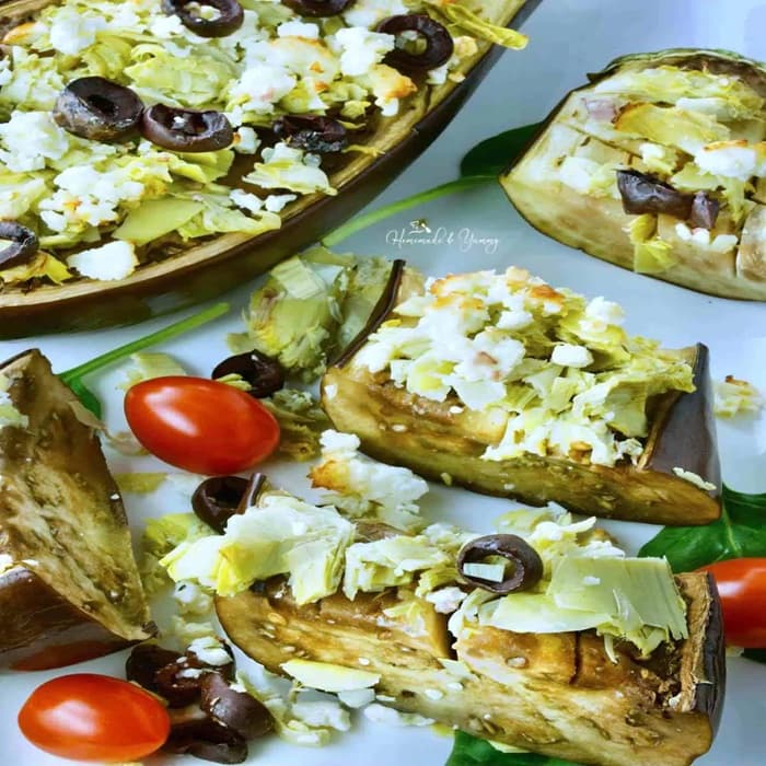 Roast aubergine with goat's cheese & toasted flatbread prepared and served as the finished dish